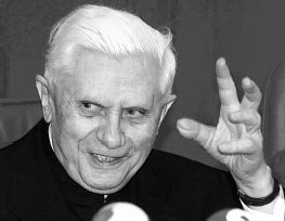 photo: Cardinal Ratzinger with a wild look in his eyes and a hand raised like a claw