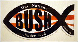 an ICHTHYS fish car magnet, inscribed with red-and-white stripes and the word BUSH.