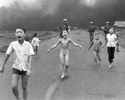 Phan Thi Kim Phuc screams in pain after being burned by napalm in her village