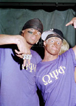 photo: white Beta Theta Pi frat brothers flash gangsta poses in blackface. Auburn, Halloween 2001