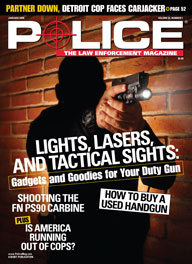 Here's a cover with a photo of a cop standing in darkness, pointing a lit-up handgun obliquely at the camera.