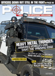 Here's a cover with a photo of heavily armed SWAT police standing in the door of a huge armored vehicle, aiming a shotgun obliquely at the camera, with the headline "Heavy Metal Thunder: Armored Vehicles Give SWAT the Winning Edge"